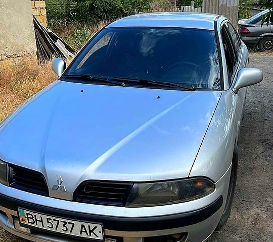 Сірий Міцубісі Харизма, об'ємом двигуна 1.9 л та пробігом 0 тис. км за 1800 $, фото 1 на Automoto.ua