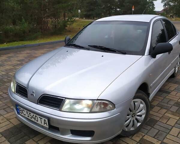 Сірий Міцубісі Харизма, об'ємом двигуна 1.6 л та пробігом 330 тис. км за 2800 $, фото 1 на Automoto.ua