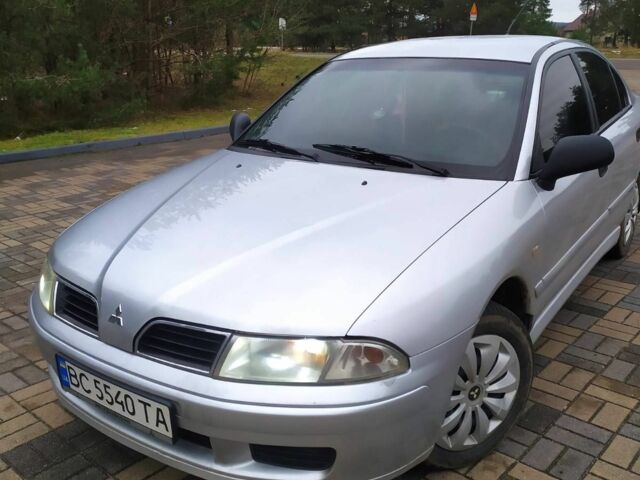 Серый Мицубиси Харизма, объемом двигателя 1.6 л и пробегом 330 тыс. км за 2800 $, фото 1 на Automoto.ua