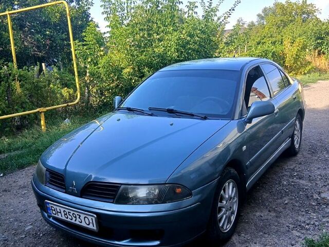 Серый Мицубиси Харизма, объемом двигателя 1.6 л и пробегом 267 тыс. км за 3500 $, фото 1 на Automoto.ua