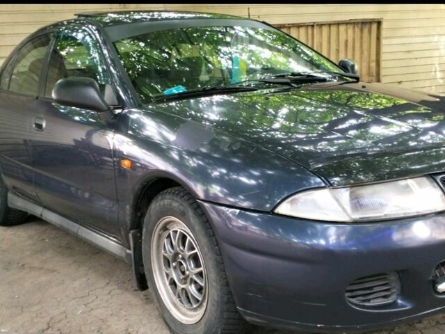 Синий Мицубиси Харизма, объемом двигателя 1.6 л и пробегом 375 тыс. км за 2250 $, фото 1 на Automoto.ua