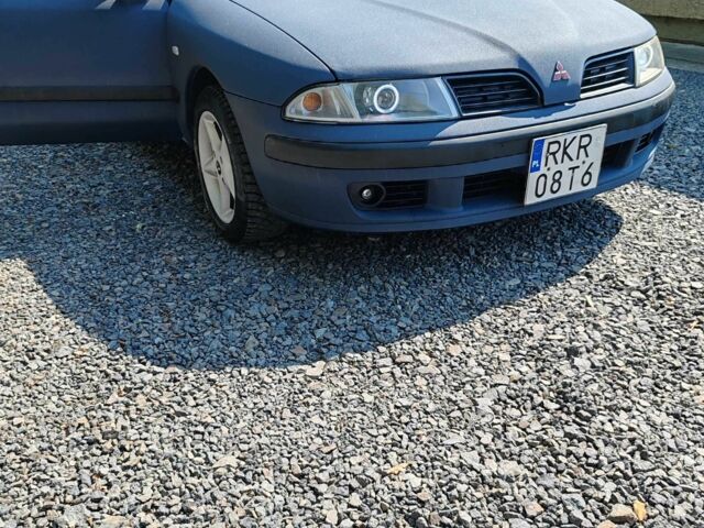 Синій Міцубісі Харизма, об'ємом двигуна 1.9 л та пробігом 300 тис. км за 2563 $, фото 1 на Automoto.ua