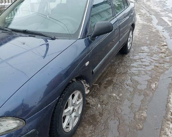 Синій Міцубісі Харизма, об'ємом двигуна 1.6 л та пробігом 220 тис. км за 2500 $, фото 1 на Automoto.ua
