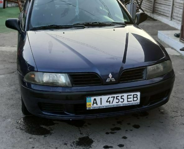 Синій Міцубісі Харизма, об'ємом двигуна 1.6 л та пробігом 277 тис. км за 3300 $, фото 1 на Automoto.ua