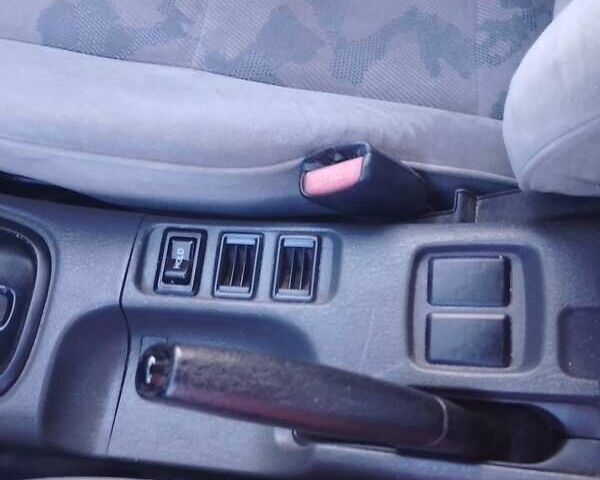 Синий Мицубиси Харизма, объемом двигателя 1.8 л и пробегом 276 тыс. км за 2400 $, фото 1 на Automoto.ua