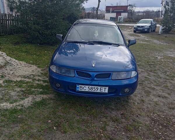 Синий Мицубиси Харизма, объемом двигателя 1.6 л и пробегом 380 тыс. км за 1900 $, фото 1 на Automoto.ua