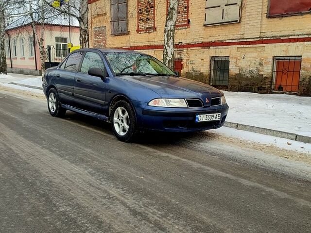 Синій Міцубісі Харизма, об'ємом двигуна 1.6 л та пробігом 273 тис. км за 3500 $, фото 1 на Automoto.ua