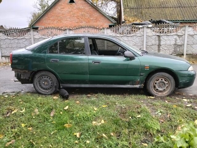 Зеленый Мицубиси Харизма, объемом двигателя 1.6 л и пробегом 2 тыс. км за 750 $, фото 1 на Automoto.ua