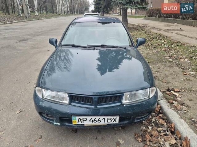 Зелений Міцубісі Харизма, об'ємом двигуна 1.8 л та пробігом 621 тис. км за 1399 $, фото 1 на Automoto.ua