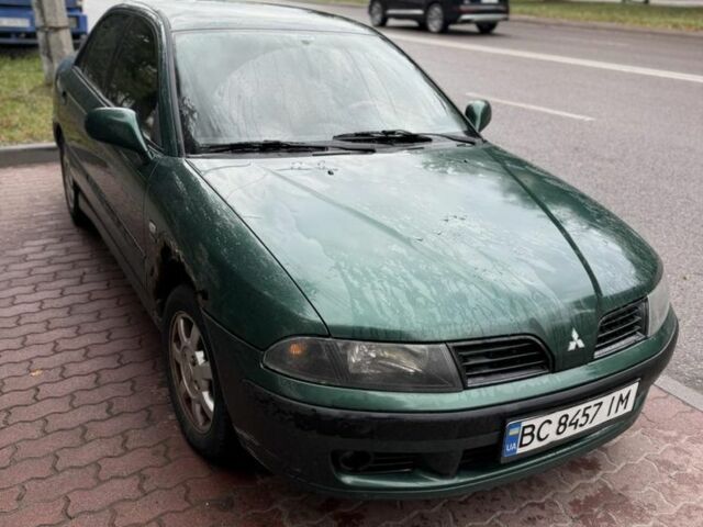 Зеленый Мицубиси Харизма, объемом двигателя 1.8 л и пробегом 300 тыс. км за 1400 $, фото 1 на Automoto.ua