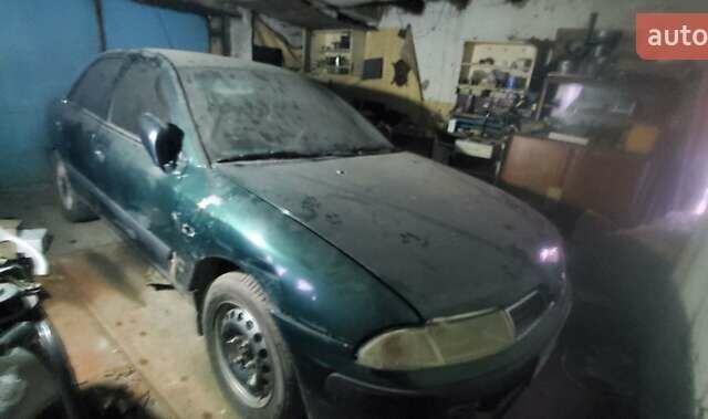 Зелений Міцубісі Харизма, об'ємом двигуна 1.8 л та пробігом 350 тис. км за 2600 $, фото 1 на Automoto.ua