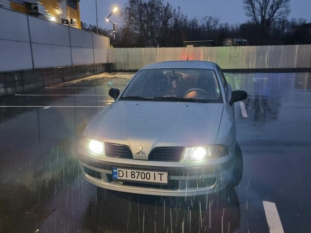 Зеленый Мицубиси Харизма, объемом двигателя 1.6 л и пробегом 220 тыс. км за 3200 $, фото 1 на Automoto.ua