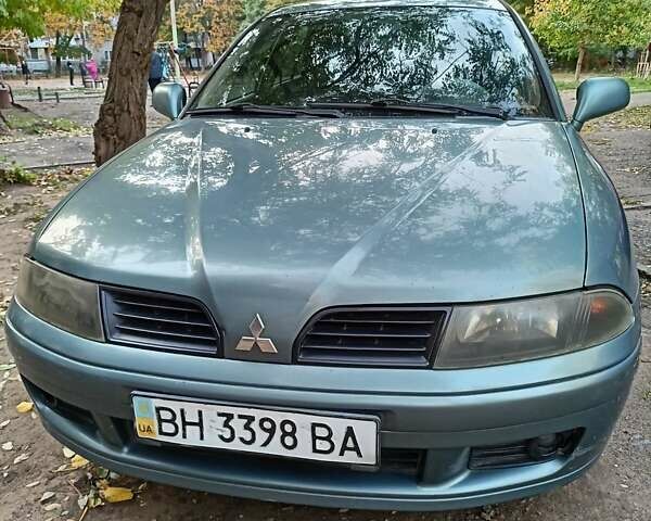Зеленый Мицубиси Харизма, объемом двигателя 1.6 л и пробегом 281 тыс. км за 3900 $, фото 1 на Automoto.ua