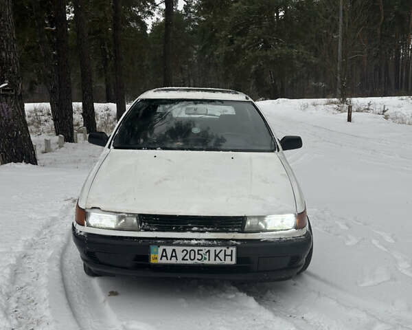 Білий Міцубісі Кольт, об'ємом двигуна 1.3 л та пробігом 300 тис. км за 750 $, фото 1 на Automoto.ua