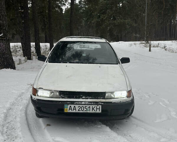 Білий Міцубісі Кольт, об'ємом двигуна 1.3 л та пробігом 300 тис. км за 750 $, фото 1 на Automoto.ua