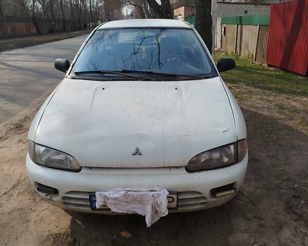 Белый Мицубиси Кольт, объемом двигателя 1.6 л и пробегом 280 тыс. км за 850 $, фото 1 на Automoto.ua