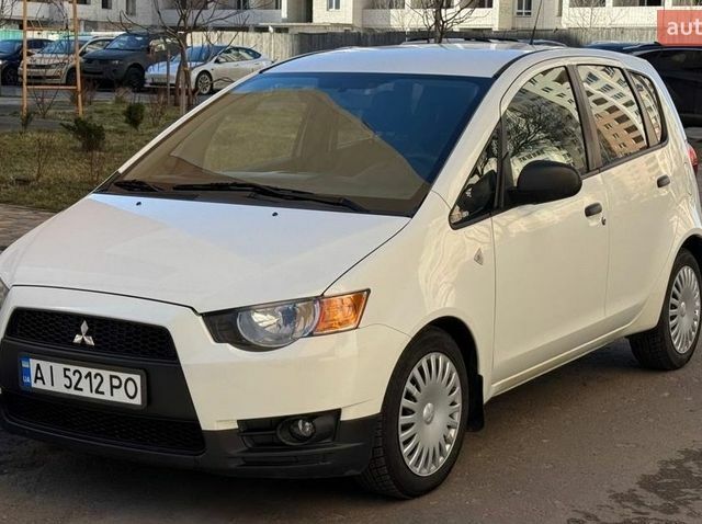 Белый Мицубиси Кольт, объемом двигателя 1.33 л и пробегом 103 тыс. км за 6750 $, фото 1 на Automoto.ua
