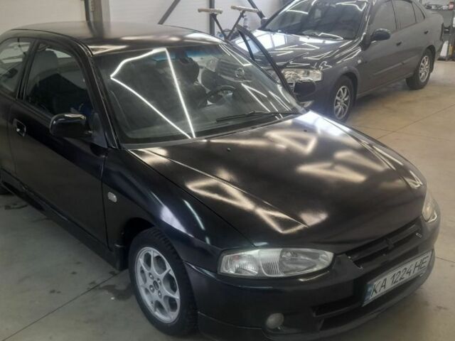 Чорний Міцубісі Кольт, об'ємом двигуна 1.3 л та пробігом 1000 тис. км за 3650 $, фото 1 на Automoto.ua