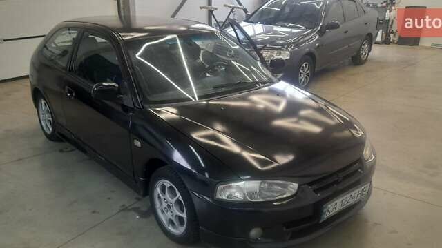 Чорний Міцубісі Кольт, об'ємом двигуна 1.3 л та пробігом 258 тис. км за 3650 $, фото 1 на Automoto.ua