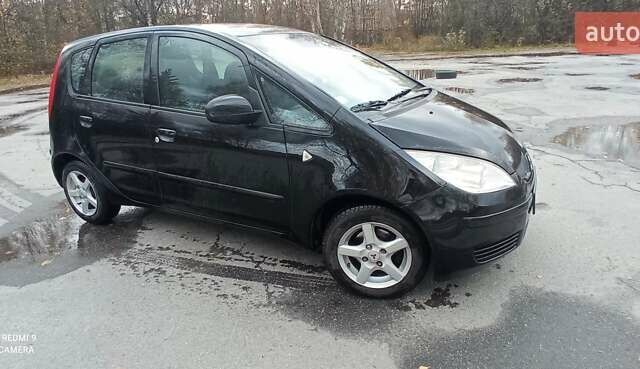 Міцубісі Кольт 2005 у Житомирі на Automoto.ua Чорний Міцубісі Кольт, об'ємом двигуна 1.33 л та пробігом 156 тис. км за 3598 $, фото 1 на Automoto.ua