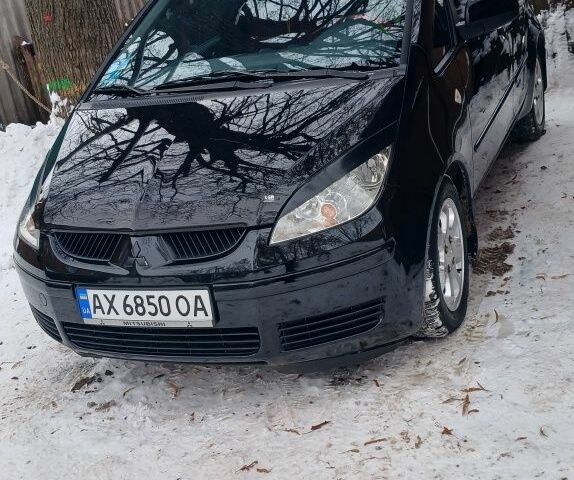 Чорний Міцубісі Кольт, об'ємом двигуна 1.3 л та пробігом 141 тис. км за 4500 $, фото 1 на Automoto.ua