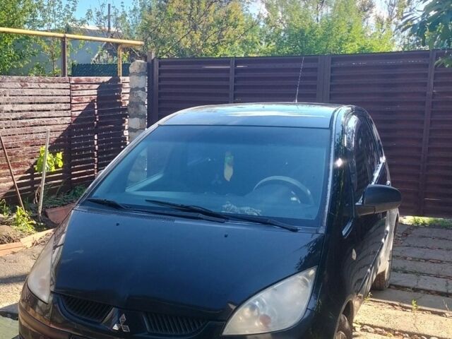 Черный Мицубиси Кольт, объемом двигателя 1.3 л и пробегом 250 тыс. км за 2500 $, фото 1 на Automoto.ua