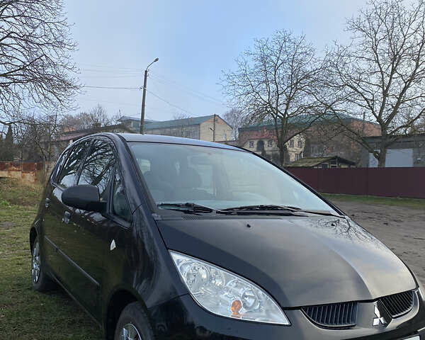 Черный Мицубиси Кольт, объемом двигателя 1.1 л и пробегом 228 тыс. км за 3100 $, фото 1 на Automoto.ua