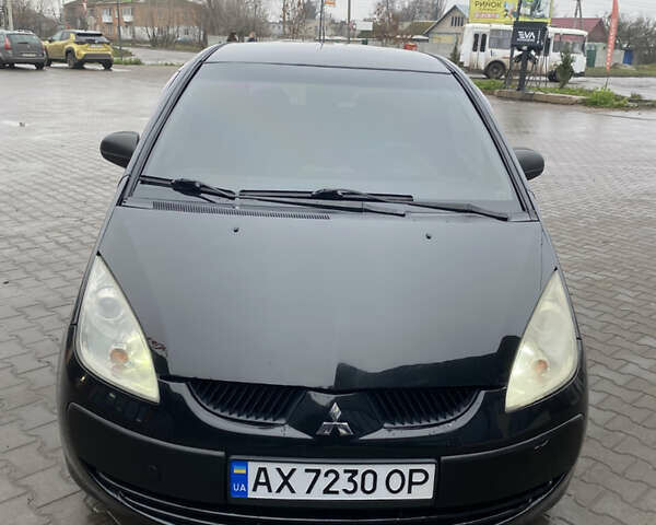 Черный Мицубиси Кольт, объемом двигателя 1.3 л и пробегом 114 тыс. км за 4000 $, фото 1 на Automoto.ua