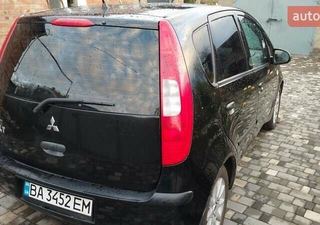 Чорний Міцубісі Кольт, об'ємом двигуна 1.3 л та пробігом 215 тис. км за 3800 $, фото 1 на Automoto.ua