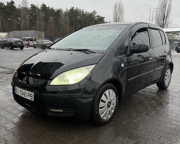 Черный Мицубиси Кольт, объемом двигателя 1.33 л и пробегом 266 тыс. км за 3300 $, фото 1 на Automoto.ua