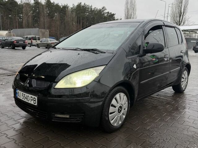 Чорний Міцубісі Кольт, об'ємом двигуна 1.3 л та пробігом 266 тис. км за 3150 $, фото 1 на Automoto.ua