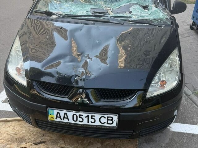 Чорний Міцубісі Кольт, об'ємом двигуна 1.33 л та пробігом 60 тис. км за 1000 $, фото 1 на Automoto.ua