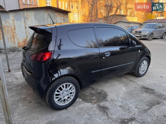 Черный Мицубиси Кольт, объемом двигателя 1.1 л и пробегом 303 тыс. км за 4000 $, фото 1 на Automoto.ua