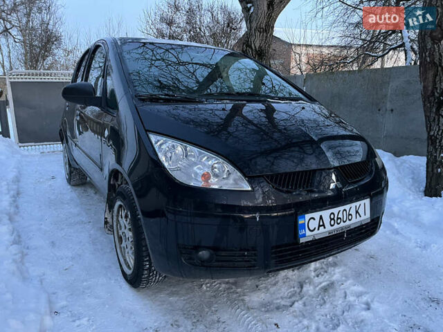 Чорний Міцубісі Кольт, об'ємом двигуна 1.3 л та пробігом 202 тис. км за 4200 $, фото 1 на Automoto.ua