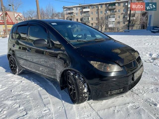 Чорний Міцубісі Кольт, об'ємом двигуна 1.33 л та пробігом 277 тис. км за 3500 $, фото 1 на Automoto.ua
