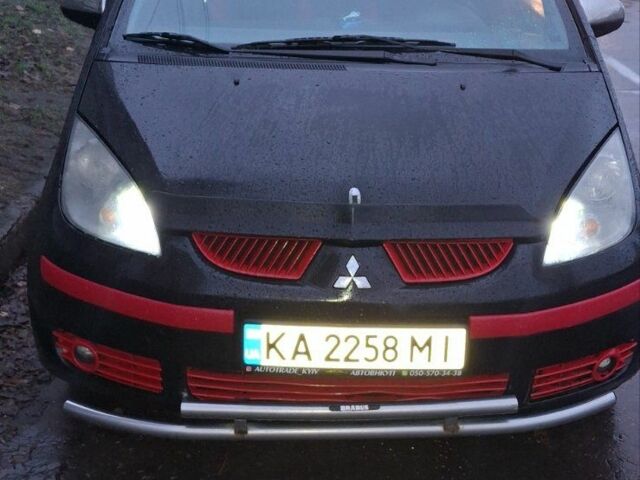 Черный Мицубиси Кольт, объемом двигателя 1.3 л и пробегом 280 тыс. км за 3500 $, фото 1 на Automoto.ua