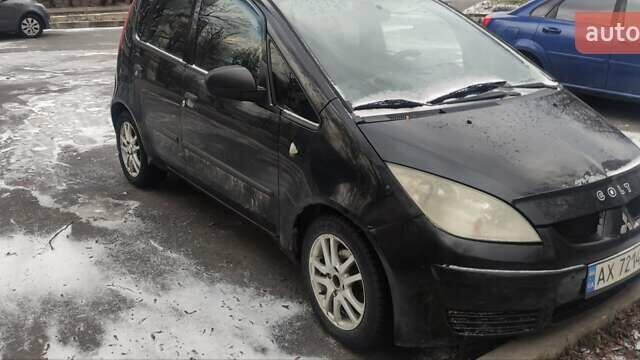 Черный Мицубиси Кольт, объемом двигателя 1.3 л и пробегом 202 тыс. км за 3900 $, фото 1 на Automoto.ua