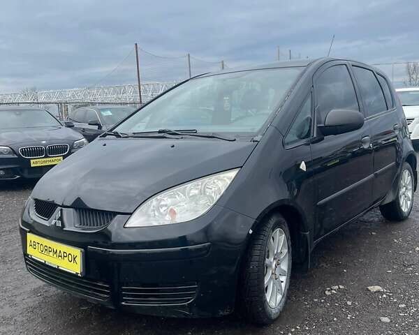 Черный Мицубиси Кольт, объемом двигателя 1.33 л и пробегом 173 тыс. км за 4490 $, фото 1 на Automoto.ua