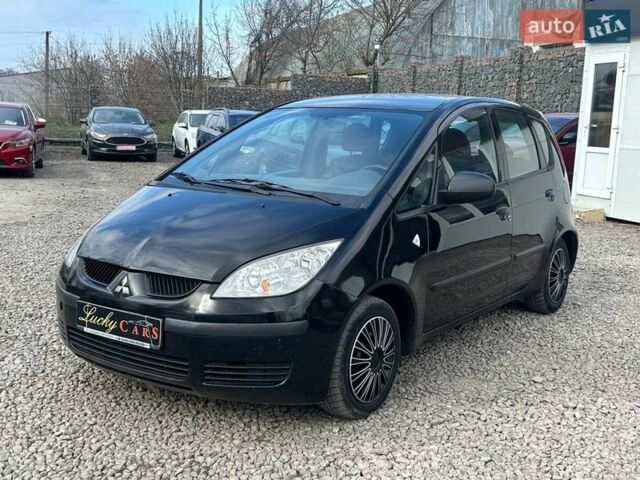 Черный Мицубиси Кольт, объемом двигателя 1.3 л и пробегом 243 тыс. км за 2900 $, фото 1 на Automoto.ua