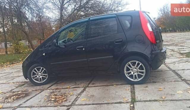 Чорний Міцубісі Кольт, об'ємом двигуна 1.3 л та пробігом 200 тис. км за 3000 $, фото 1 на Automoto.ua