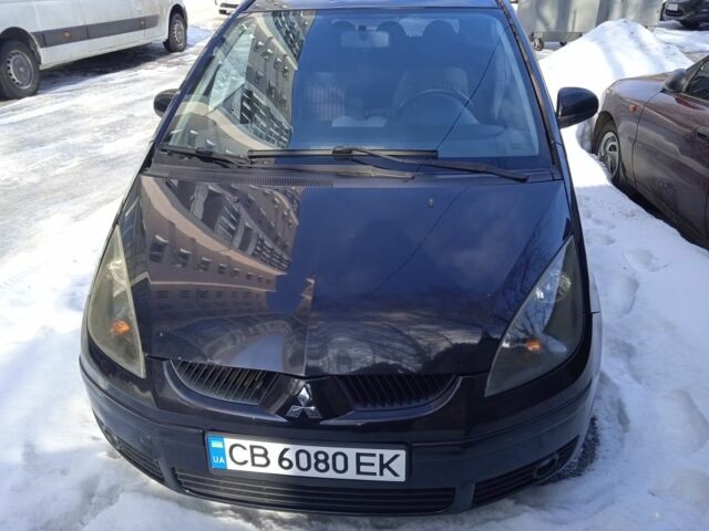 Черный Мицубиси Кольт, объемом двигателя 1.3 л и пробегом 221 тыс. км за 4300 $, фото 1 на Automoto.ua