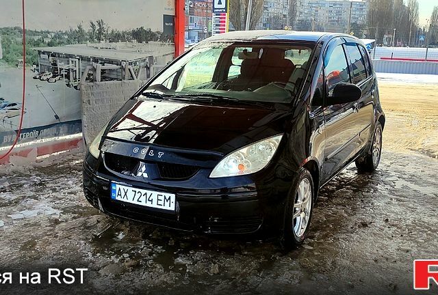 Чорний Міцубісі Кольт, об'ємом двигуна 1.3 л та пробігом 202 тис. км за 3800 $, фото 1 на Automoto.ua