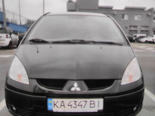 Чорний Міцубісі Кольт, об'ємом двигуна 1.3 л та пробігом 184 тис. км за 5000 $, фото 1 на Automoto.ua
