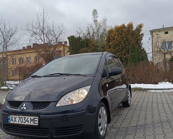 Чорний Міцубісі Кольт, об'ємом двигуна 1.33 л та пробігом 198 тис. км за 3900 $, фото 1 на Automoto.ua