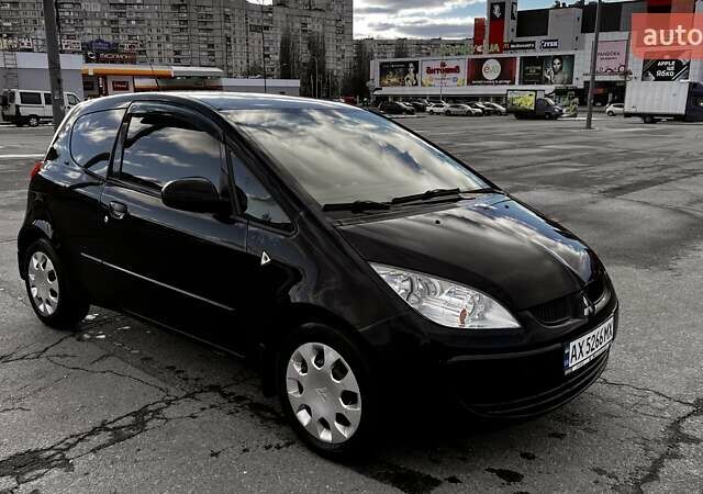 Черный Мицубиси Кольт, объемом двигателя 1.33 л и пробегом 230 тыс. км за 3900 $, фото 1 на Automoto.ua