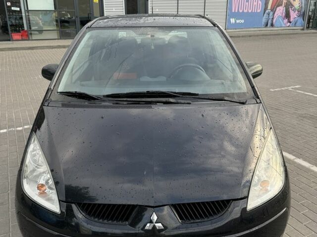 Черный Мицубиси Кольт, объемом двигателя 1.3 л и пробегом 228 тыс. км за 3300 $, фото 1 на Automoto.ua