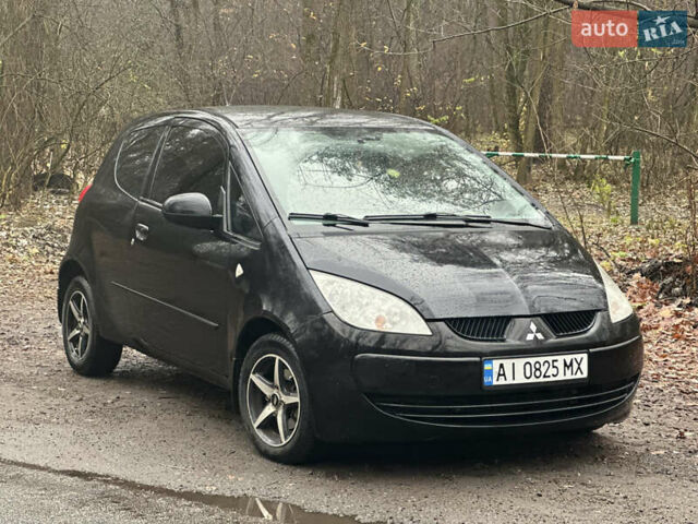 Чорний Міцубісі Кольт, об'ємом двигуна 1.32 л та пробігом 181 тис. км за 4400 $, фото 1 на Automoto.ua