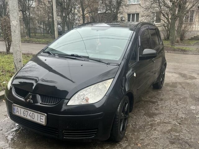 Черный Мицубиси Кольт, объемом двигателя 1.3 л и пробегом 237 тыс. км за 3900 $, фото 1 на Automoto.ua