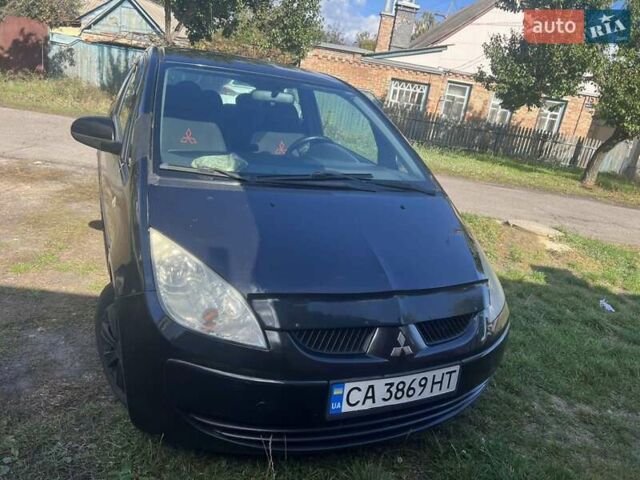 Черный Мицубиси Кольт, объемом двигателя 1.3 л и пробегом 195 тыс. км за 3500 $, фото 1 на Automoto.ua