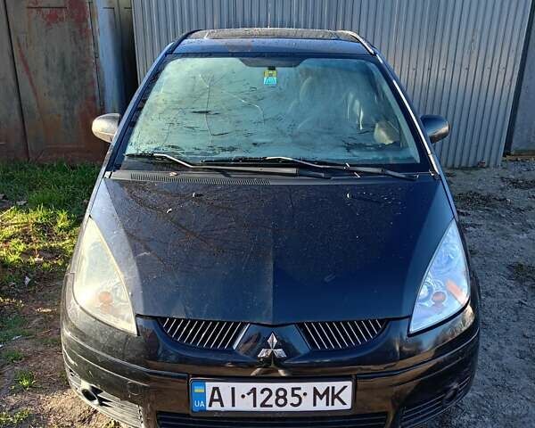 Черный Мицубиси Кольт, объемом двигателя 1.33 л и пробегом 316 тыс. км за 2700 $, фото 1 на Automoto.ua